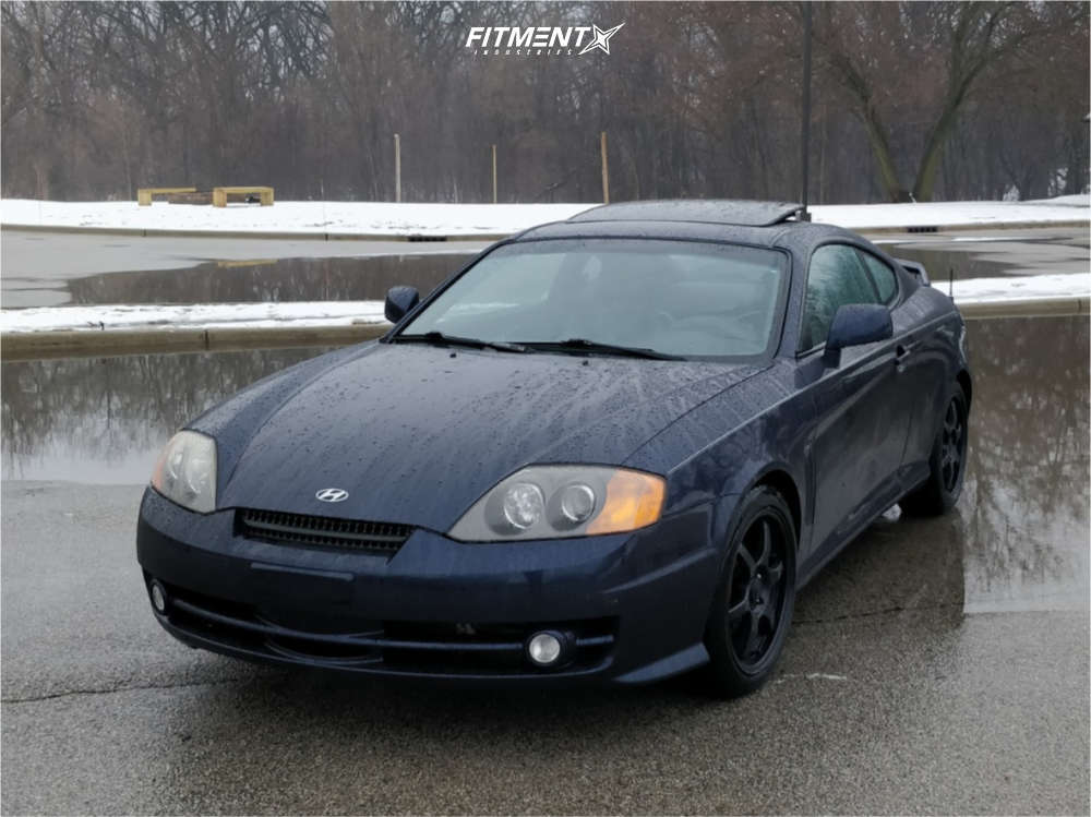 2004 Hyundai Tiburon GT with 17x7.5 Konig Backbone and Continental 215x45  on Stock Suspension | 629214 | Fitment Industries