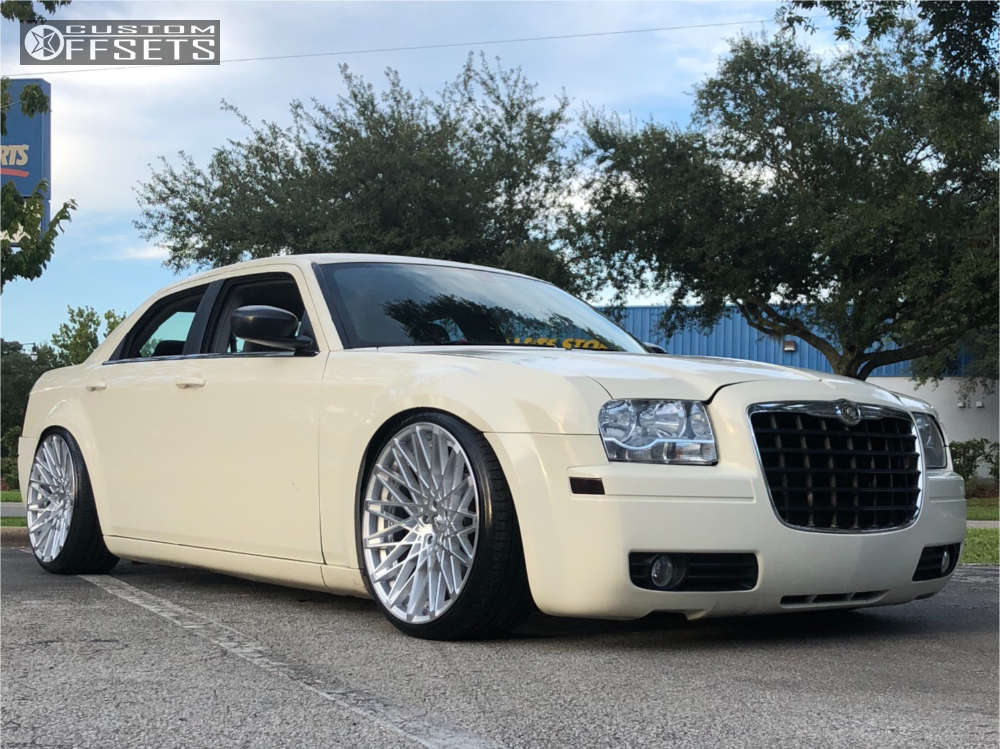 2007 Chrysler 300 with 22x10.5 25 Rosso Skism and 265/30R22 Nexen Nfera Su1  and Lowering Springs | Custom Offsets