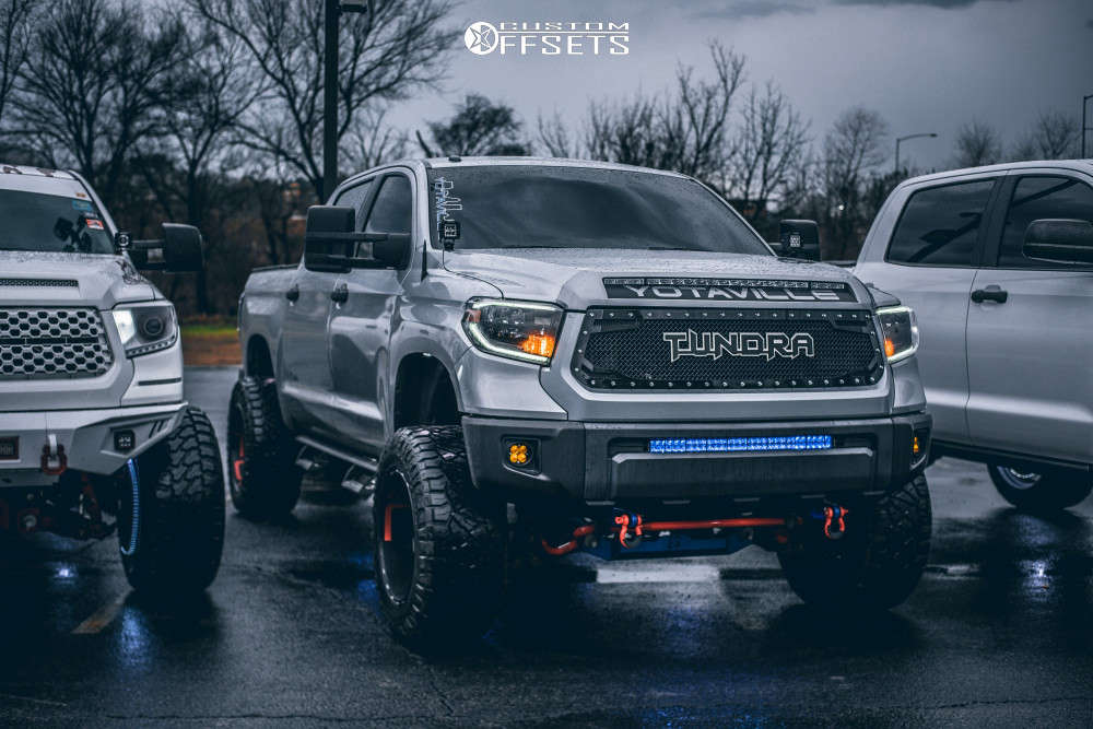 2016 Toyota Tundra with 20x12 -43 Fuel Triton and 35/13.5R20 Nitto Ridge  Grappler and Suspension Lift 7" | Custom Offsets