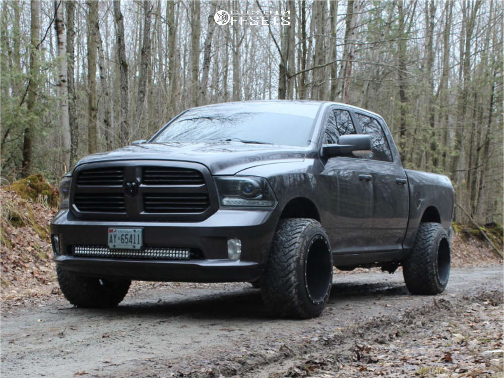 2014 Ram 1500 with 20x14 -76 Fuel Maverick and 33/12.5R20 Fuel Mud Gripper  and Leveling Kit | Custom Offsets