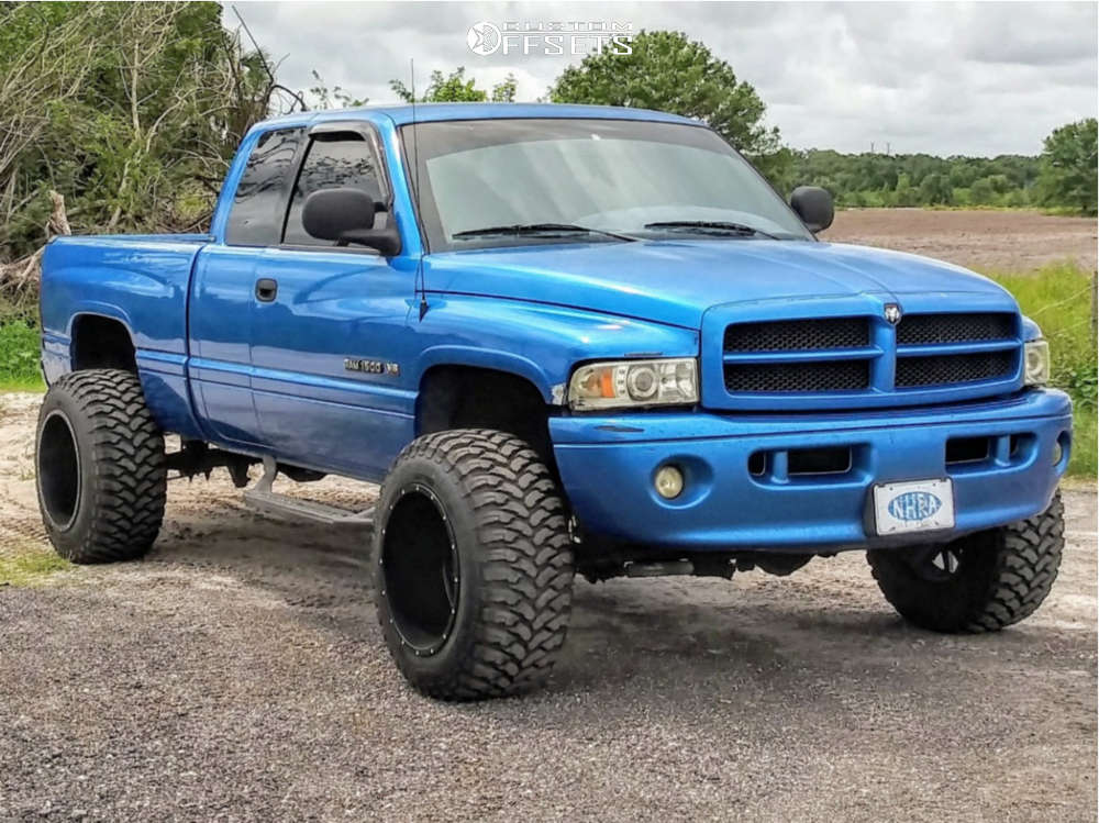 2001 Dodge Ram 1500 with 20x14 -76 Monster Offroad M12 and 35/13.5R20 RBP  Repulsor Mt and Suspension Lift 3" | Custom Offsets