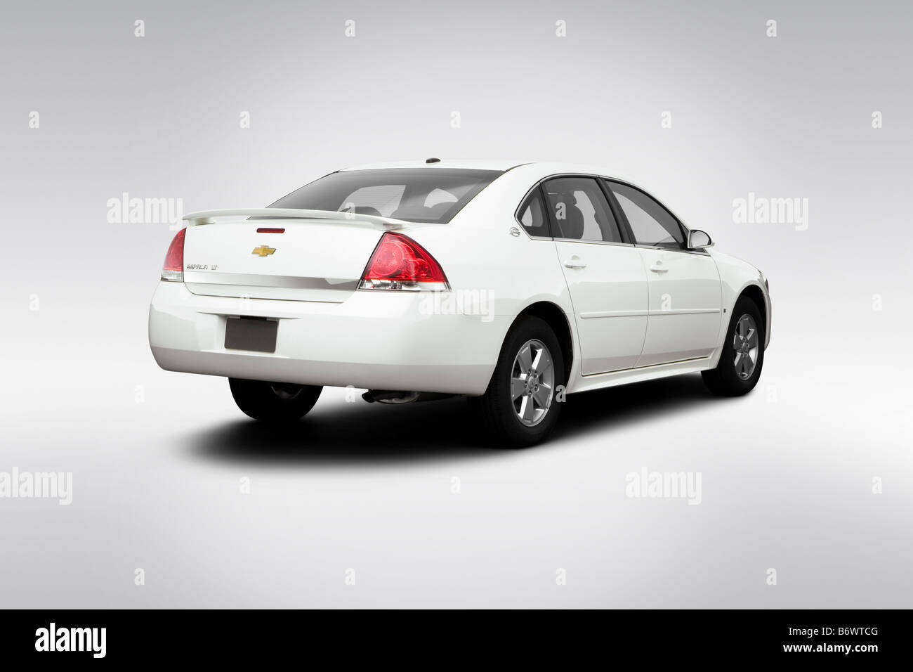 2009 Chevrolet Impala LT in White - Rear angle view Stock Photo - Alamy