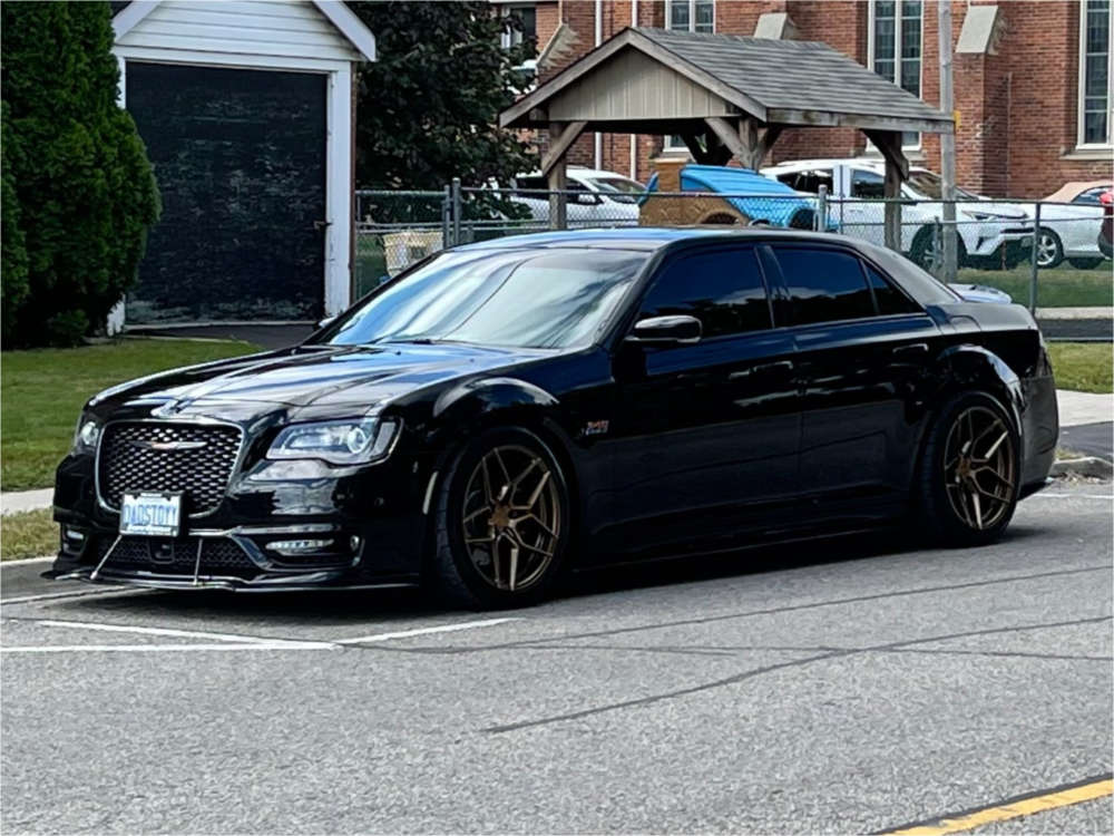 2020 Chrysler 300 with 20x10 40 Rohana Rfx11 and 275/40R20 Firestone Indy  500 and Coilovers | Custom Offsets
