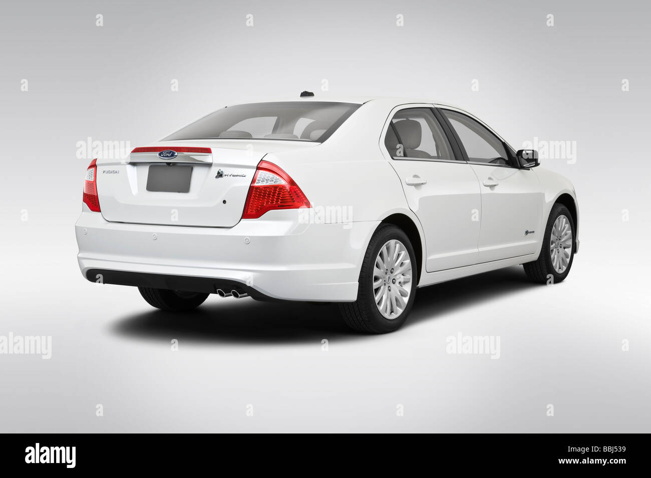 2010 Ford Fusion Hybrid in White - Rear angle view Stock Photo - Alamy